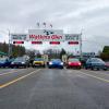 cars lined up at grand prix event