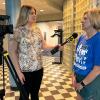 TV reporter interviews assistant dean
